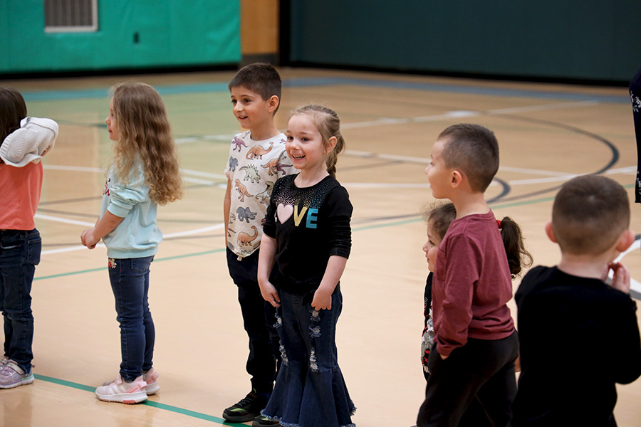 Image of students standing in the gym. 