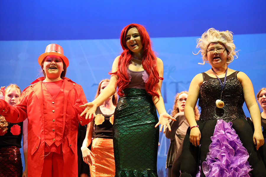Image of students performing the Little Mermaid. 