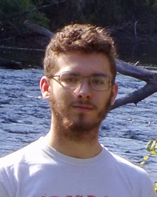 A student smiling for a photo