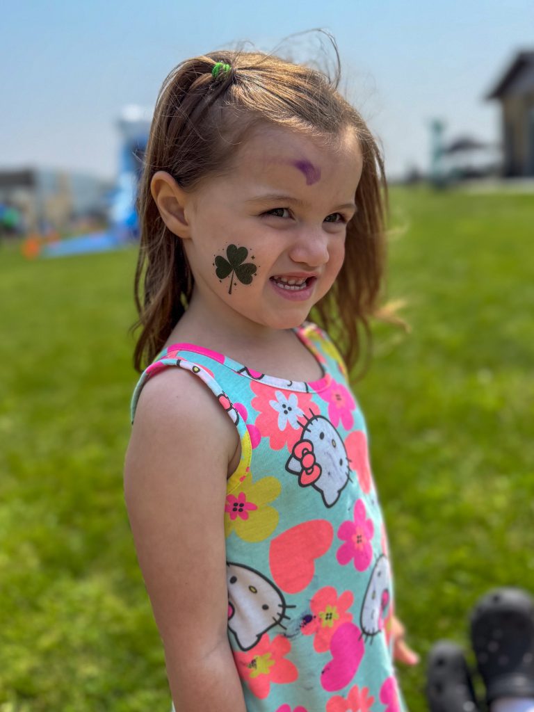 young girl with face paint at shamrockin event 